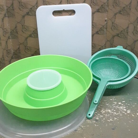 4 pc bundle; Covered fruit/veggie tray, cutting board, & set of 2 strainers - Picture 1 of 12